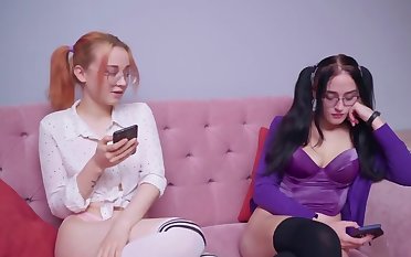 Two naughty schoolgirl are playing with some sex toys